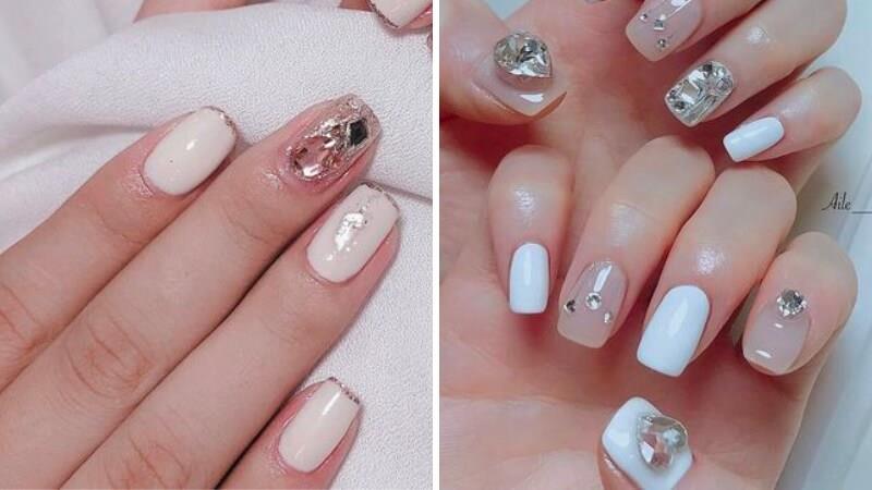 Nail trắng với đá quý sang trọng