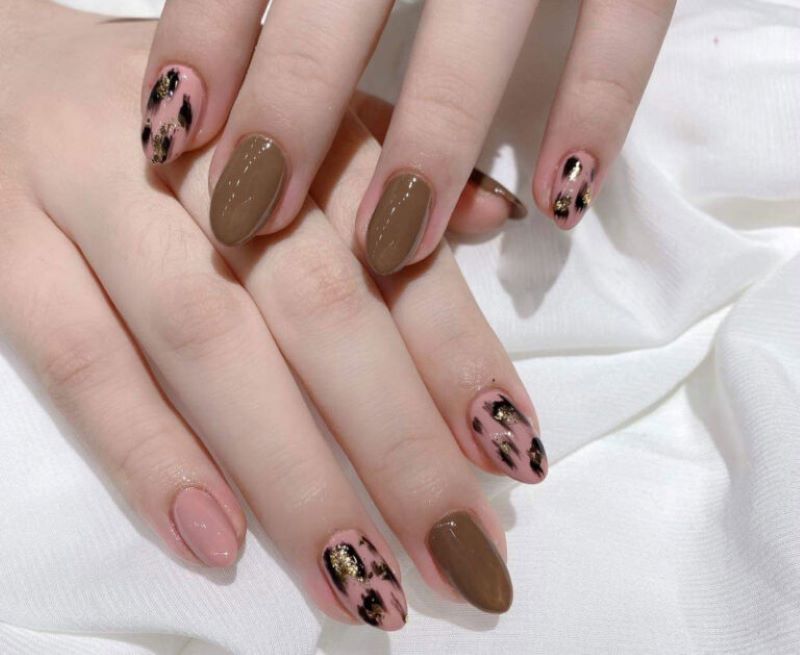 Mẫu nail da báo màu nail hợp với cô nàng mệnh kim