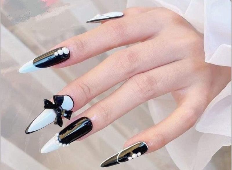 Nail móng nhọn sang chảnh charm nơ hút mắt 