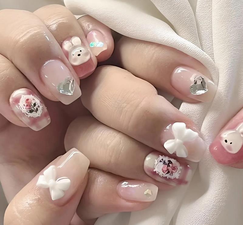 Nail thỏ đính nơ kèm hoạ tiết cho nàng bánh bèo 